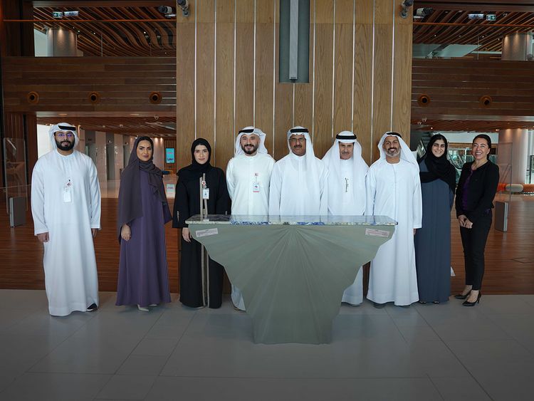 Amer Khansaheb, Managing Director at Khansaheb Group (3rd from Right), Samr Husain Al Marzooqi, Director of Events and Communications Department at Mohammed Bin Rashid Library (4th From Left), Dr. Mazna Ahmad Abdulrahim Mahmood Hafiz, Director of Corporate Support Department (3rd from Left), Amal Alblooshi, Head of Marketing and Communication, Events & Communication Department (2nd from Left), and officials of Khansaheb Group seen with the Niki Console